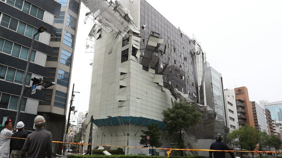 Building in Osaka with windows and cladding torn off