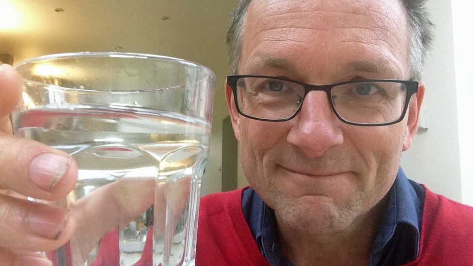 Michael Mosley with glass of water