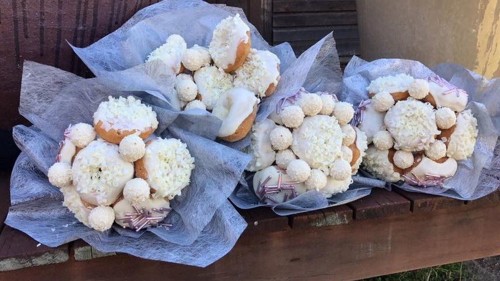 The four doughnut bouquets are laid out