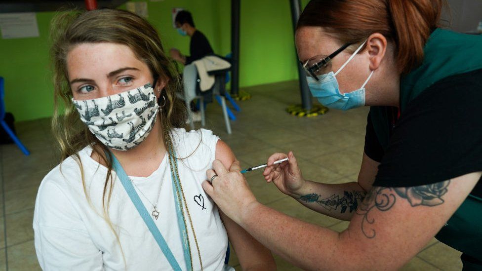 Danielle Stanley, 21, receives a Covid vaccine at a new pop up vaccination service on 22 June in Newcastle upon Tyne, England