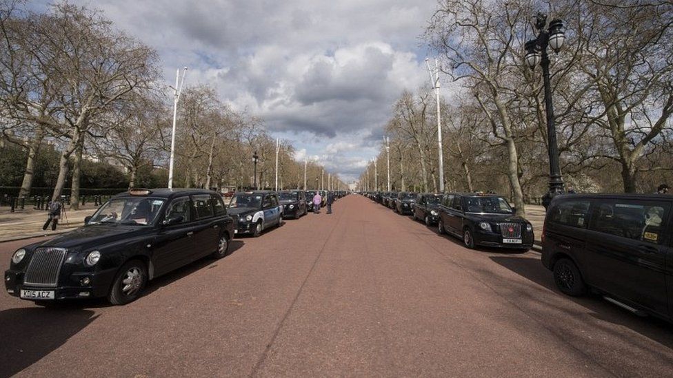 Black cabs parked on the Mall
