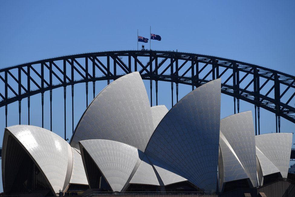 he Australian flag is seen half mast on the Sydney Harbour Bridge following the death of Prince Philip, Duke of Edinburgh, at Admiralty House, in Sydney, Australia, 10 April 2021.