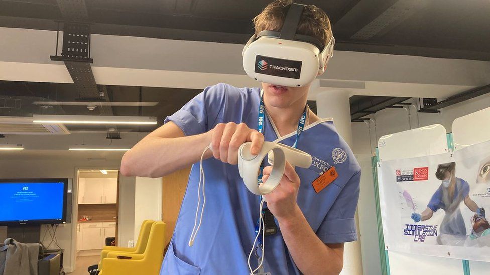 Medical student William Godfrey using the virtual reality headset