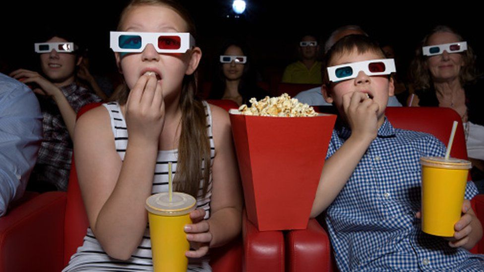 Young people in the cinema