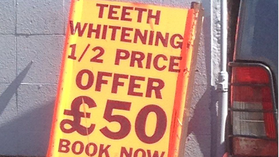 The sign outside Simply Chic offering teeth whitening
