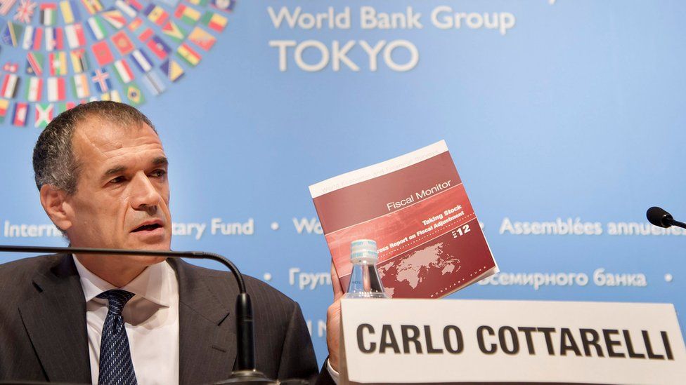 Carlo Cottarelli holds a news briefing on the Fiscal Monitor at the Tokyo International Forum in Tokyo, 9 October 2012.