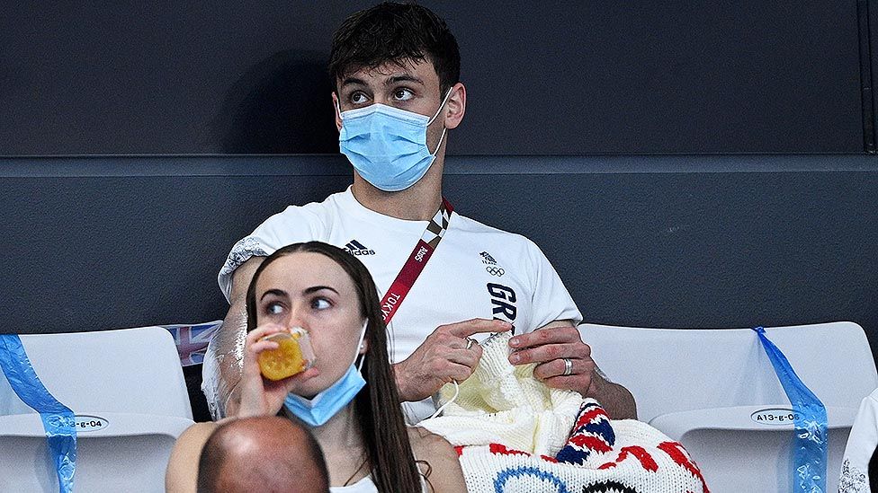 Tom Daley knitting poolside at the 2020 Olympics in Tokyo