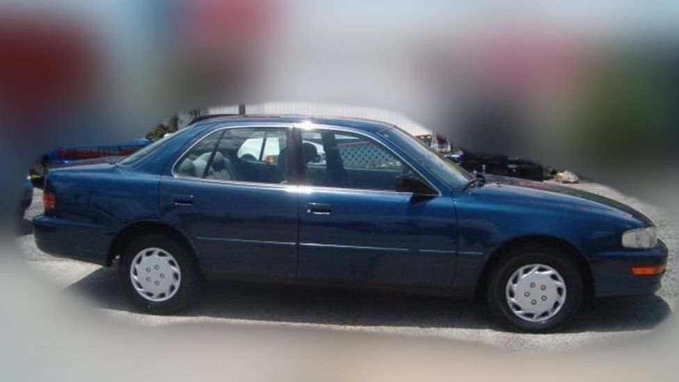 A dark blue Toyota Camry, the type of car used by David Black's killers