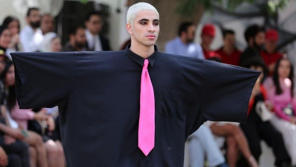 A model presents a creation by Egyptian fashion designer Waseem Khadra during the first edition of the Egypt's Fashion Week at Agriculture Museum in Giza, Egypt, 13 May 2023.