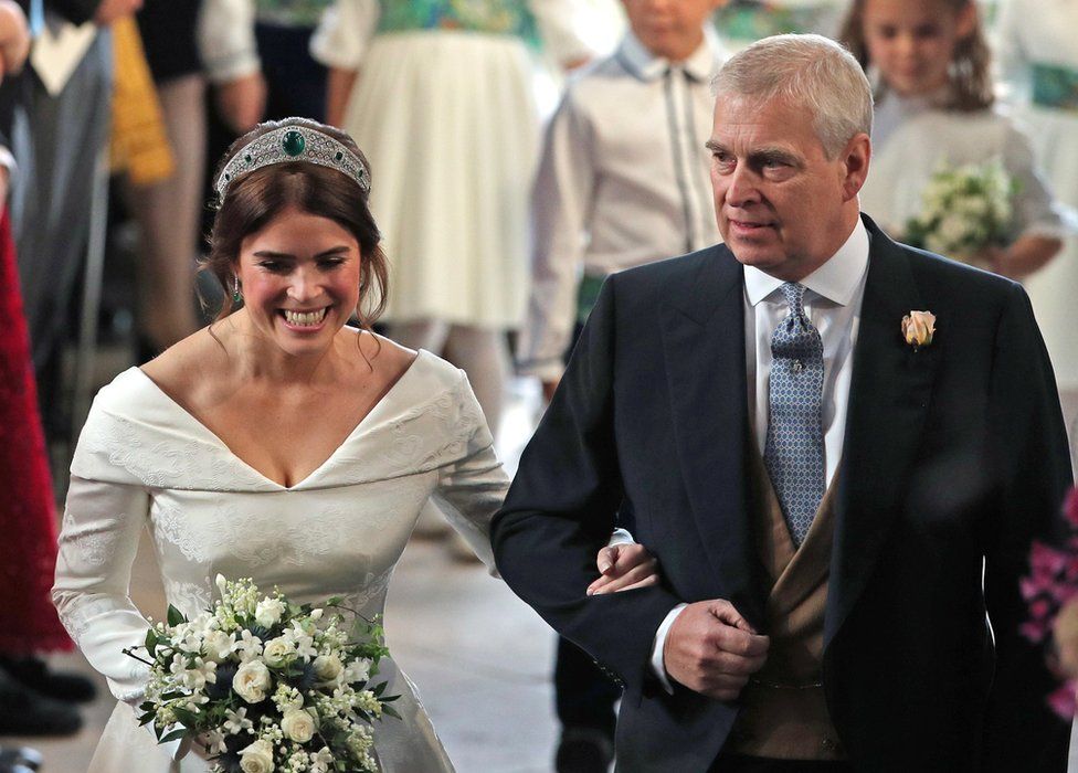 Princess Eugenie walks down the aisle with her father, the Duke of York, for her wedding to Jack Brooksbank at St George"s Chapel in Windsor Castle