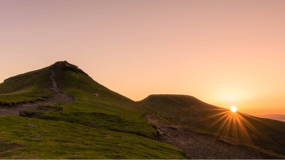 Sunrise at the summit of Pen Y Fan in the Brecon Beacons
