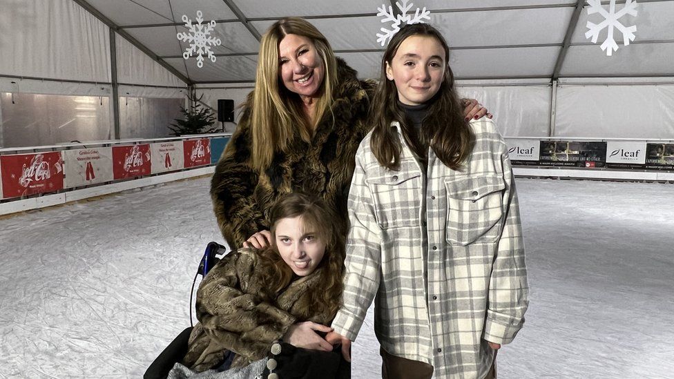 Jodie with her mum Kerry and sister Emily