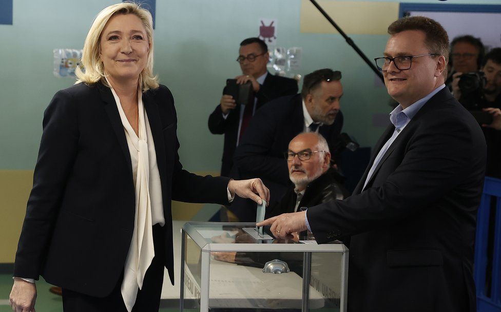 French far-right Rassemblement National (RN) party candidate for the French presidential election Marine Le Pen casts her ballot at a polling station for the second round of the French presidential elections in Henin-Beaumont