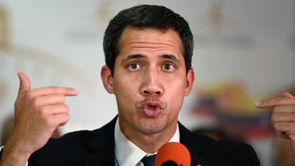 Venezuelan opposition leader Juan Guaido gestures as he speaks during a press conference in Caracas on May 14, 2019.