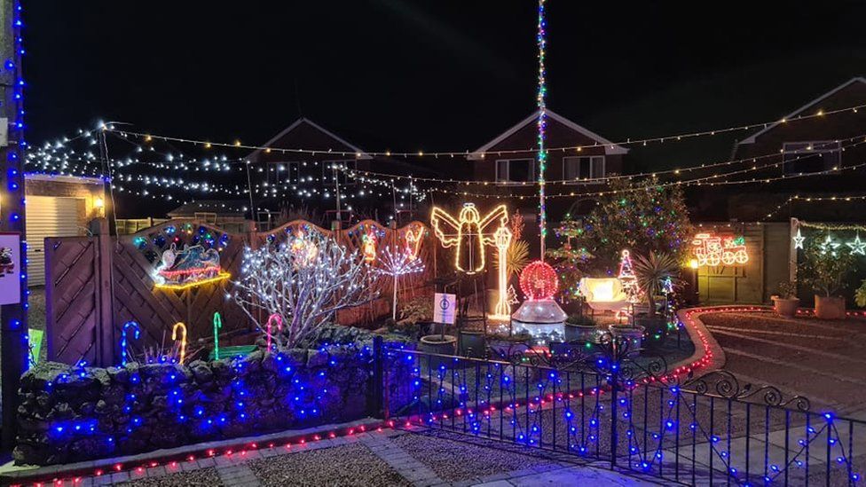 Christmas lights covering a house
