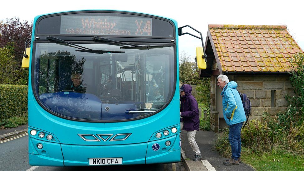 Passengers boarding the X5 Whitby bus.