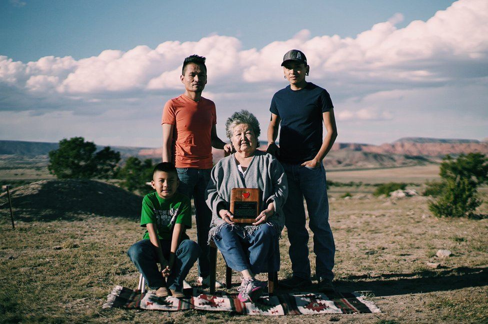 Sister Begay, 68 (centre) with her son Jonathan Begay, 33 (back left), her grandsons Marcus Begay, 27 (back right), and Calibe, 8 (front left)