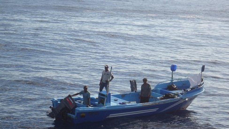 Four fishermen on a boat adrift in the Pacific off the coast off Chiapas