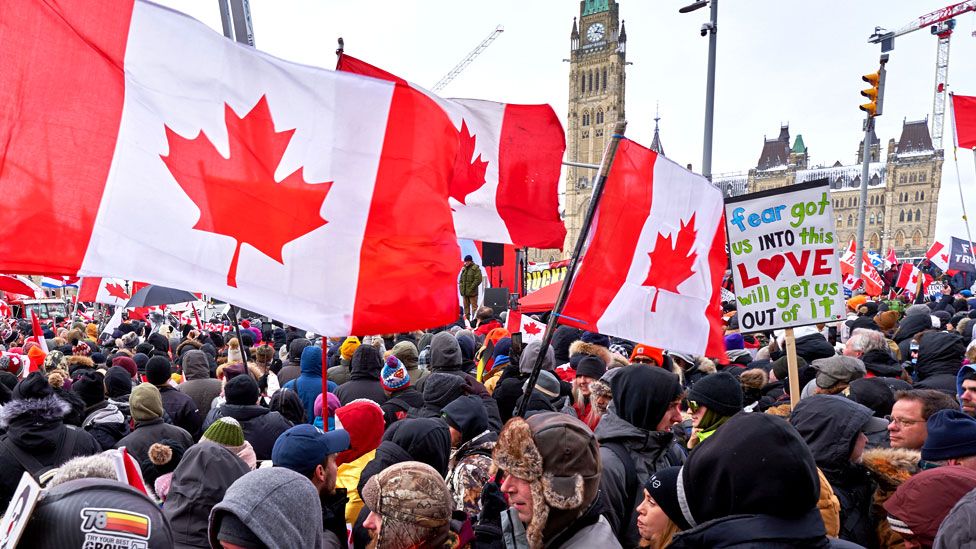 Supporters gather near Parliament hill as truckers continue to protest in Ottawa, Ontario, Canada, on 12 February 2022