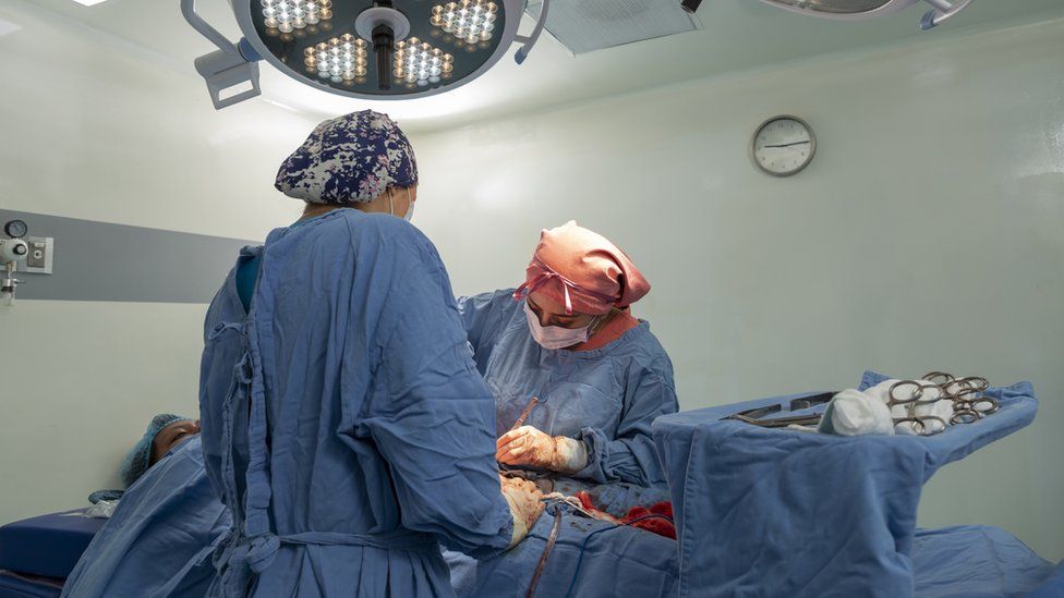 A caesarean section being performed