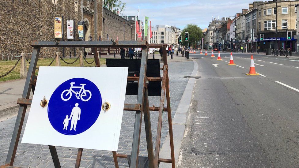Sign for pedestrians and cycles on temporary lane on Castle Street in Cardiff