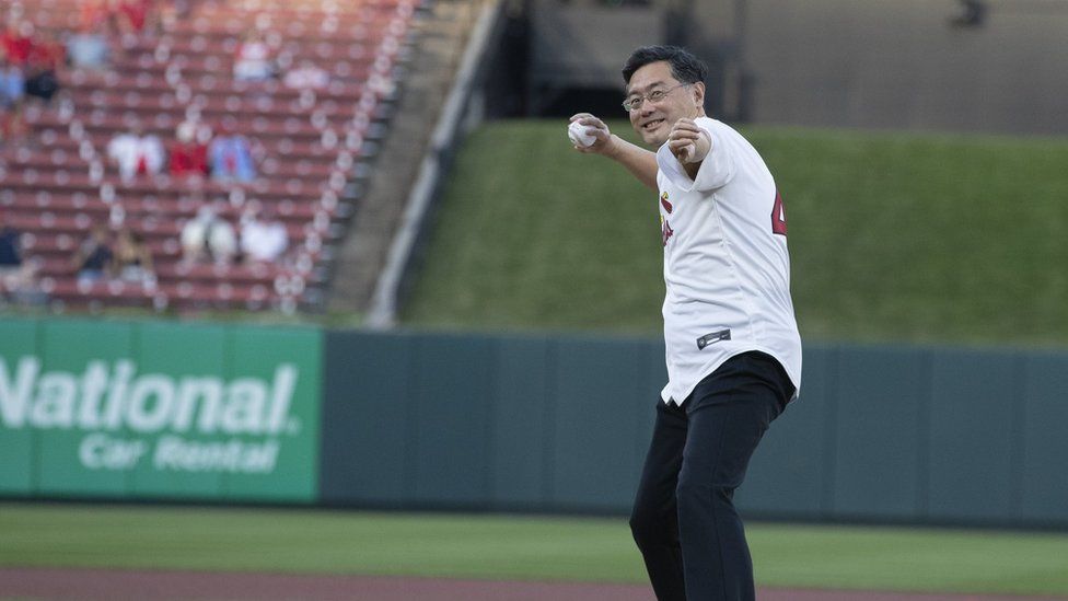 Picture of former Chinese foreign minister Qin Gang throwing a pitch at a US baseball game