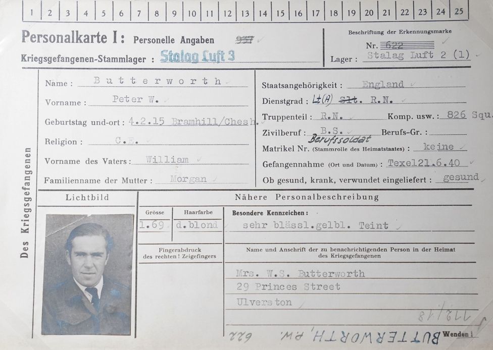 The prisoner of war record card of Peter Butterworth on display as part of the Great Escapes: Remarkable Second World War Captives exhibition at the National Archives, Kew, Richmond,