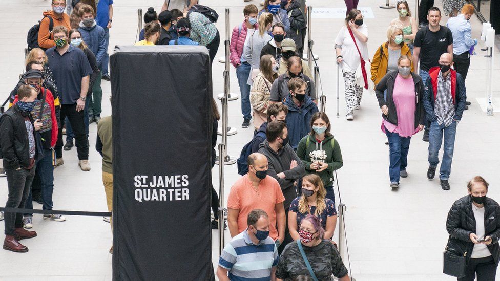 People queuing for shops in Edinburgh