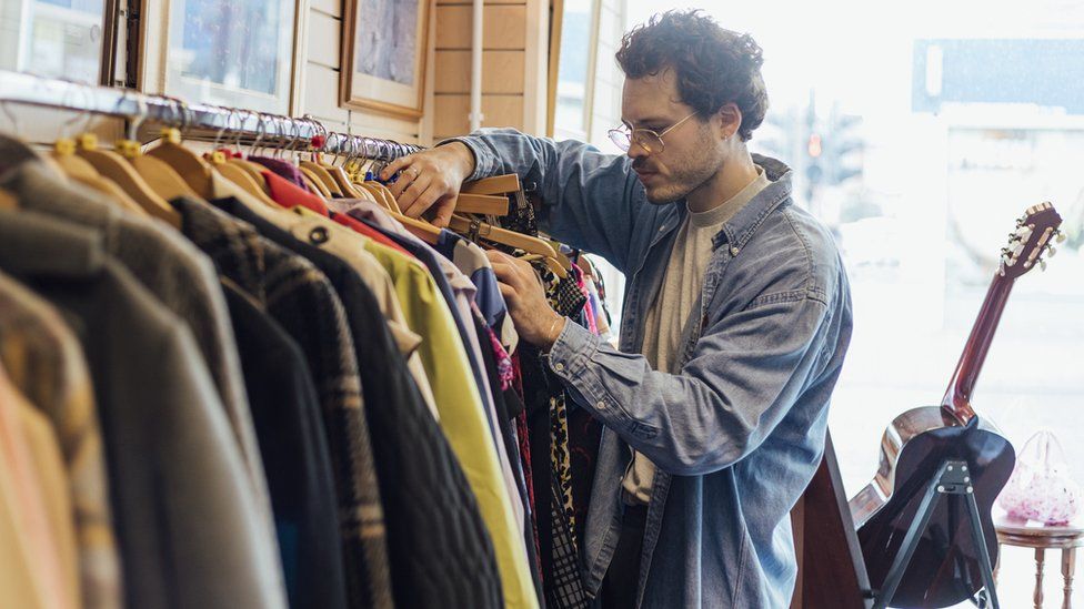 Man in charity shop