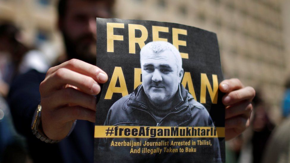 A man attends a rally in Tbilisi, Georgia on 31 May 2017 to support Azeri Journalist Afgan Mukhtarli, who was abducted in Tbilisi on 29 May and now is in detention in Baku, Azerbaijan