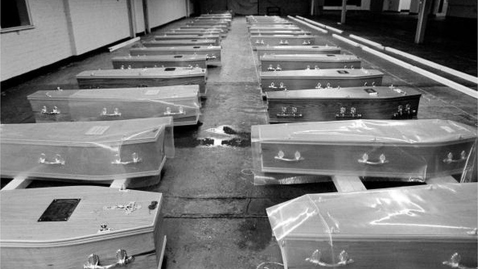 coffins in a disused Liverpool warehouse