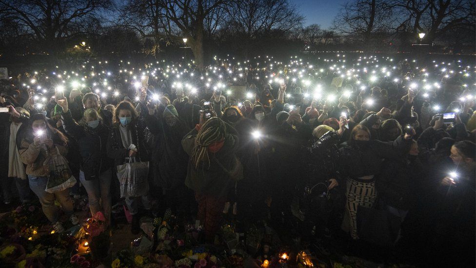 Hundreds turn on their phone torches at the bandstand in Clapham Common