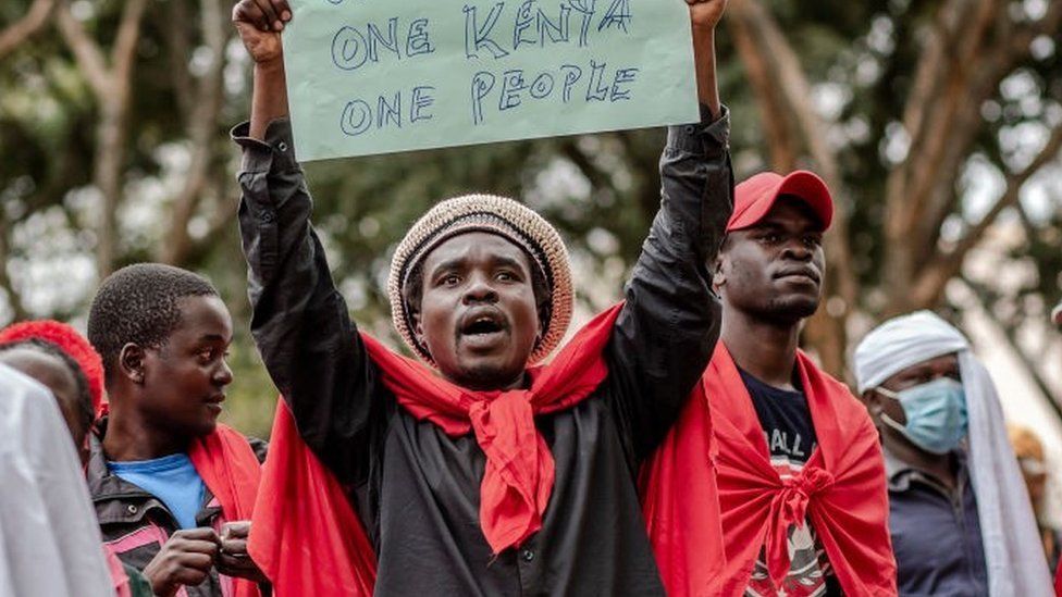Protesters chant slogans while marching during a protest to demand peaceful elections and justice for victims of post-election violence in Nairobi, Kenya on June 23, 2022, kenya general election