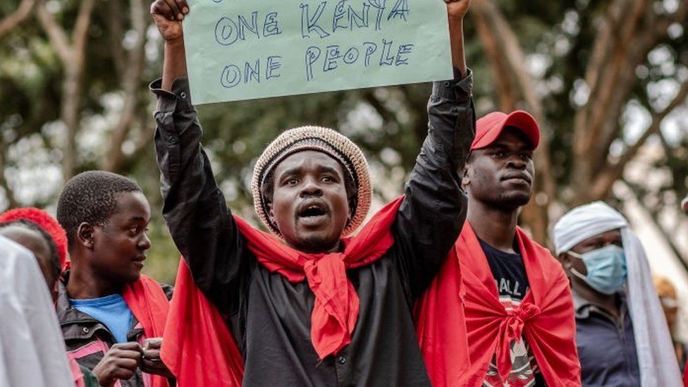 Protesters chant slogans while marching during a protest to demand peaceful elections and justice for victims of post-election violence in Nairobi, Kenya on June 23, 2022