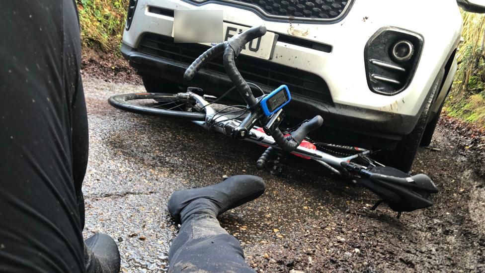 Photo of Mr Singh's accident with his bike underneath a car