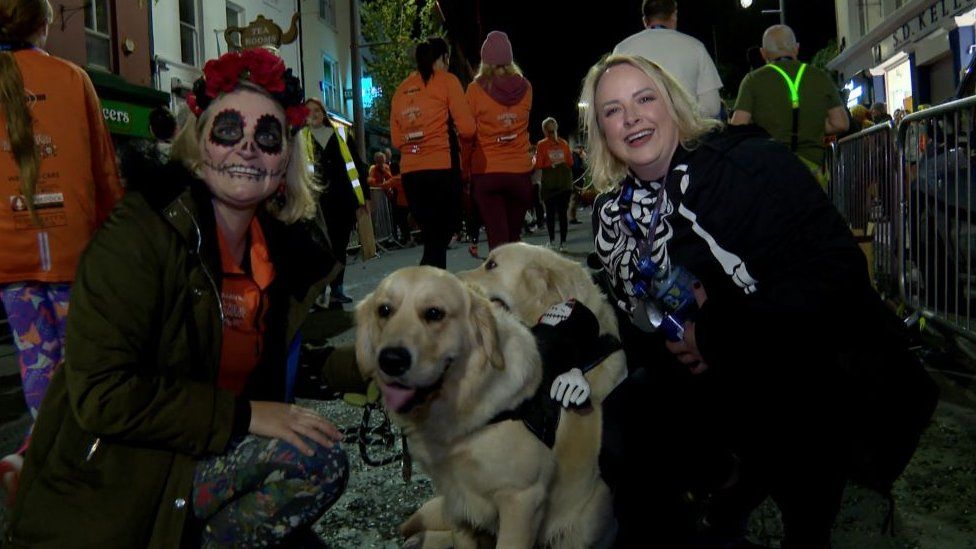 Arlene Ferguson and Lorraine Browne with their dogs Winston and Bailey