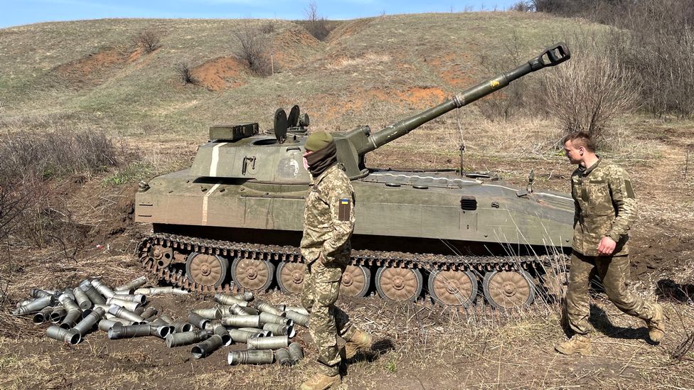 Ukrainian forces alongside a tank