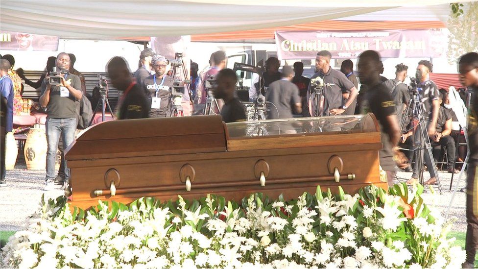 'Mourners file past Christian Atsu's casket