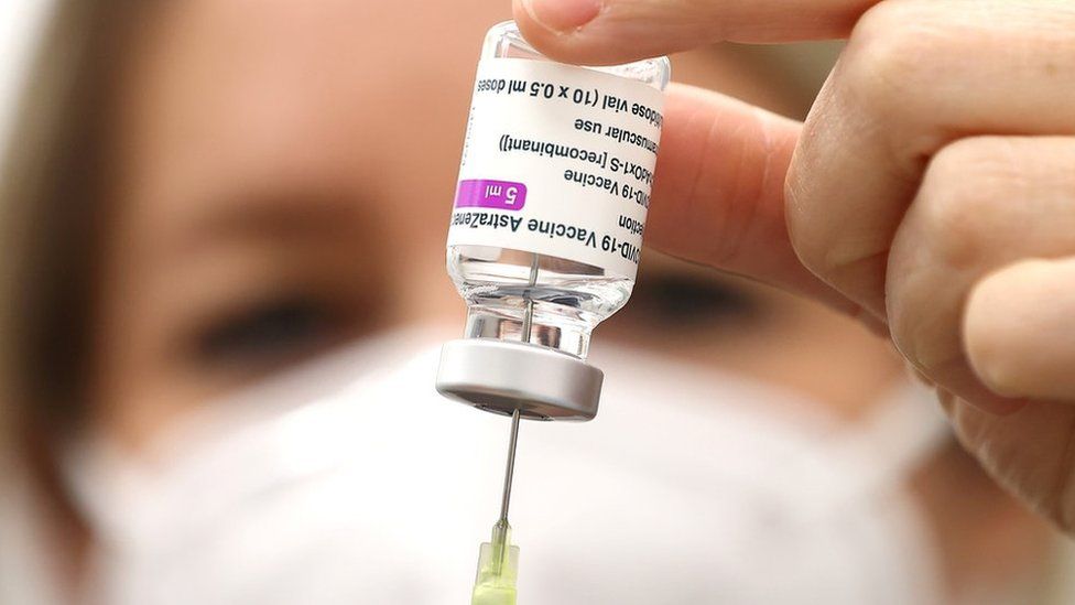 Medical personnel prepare AstraZeneca COVID-19 vaccine, stock image