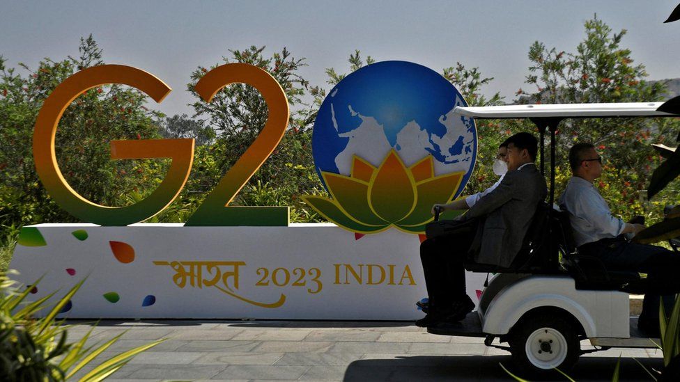 Delegates ride in a buggy at G20 finance officials meeting venue near Bengaluru, India