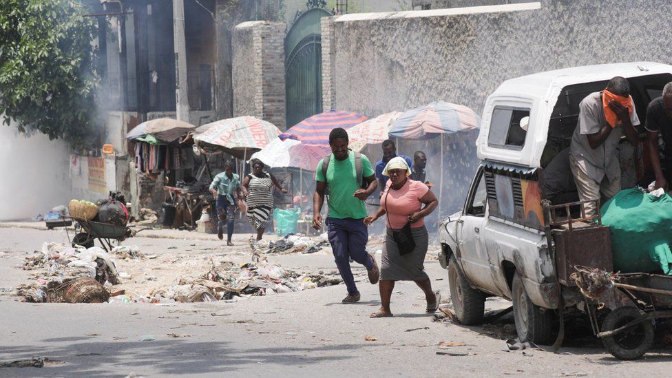 Police used tear gas near a market in Port-au-Prince, Haiti