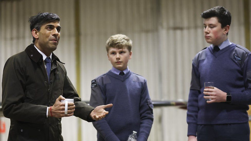 Prime Minister Rishi Sunak speaks to RAF air cadets during a visit to RAF Valley on Anglesey