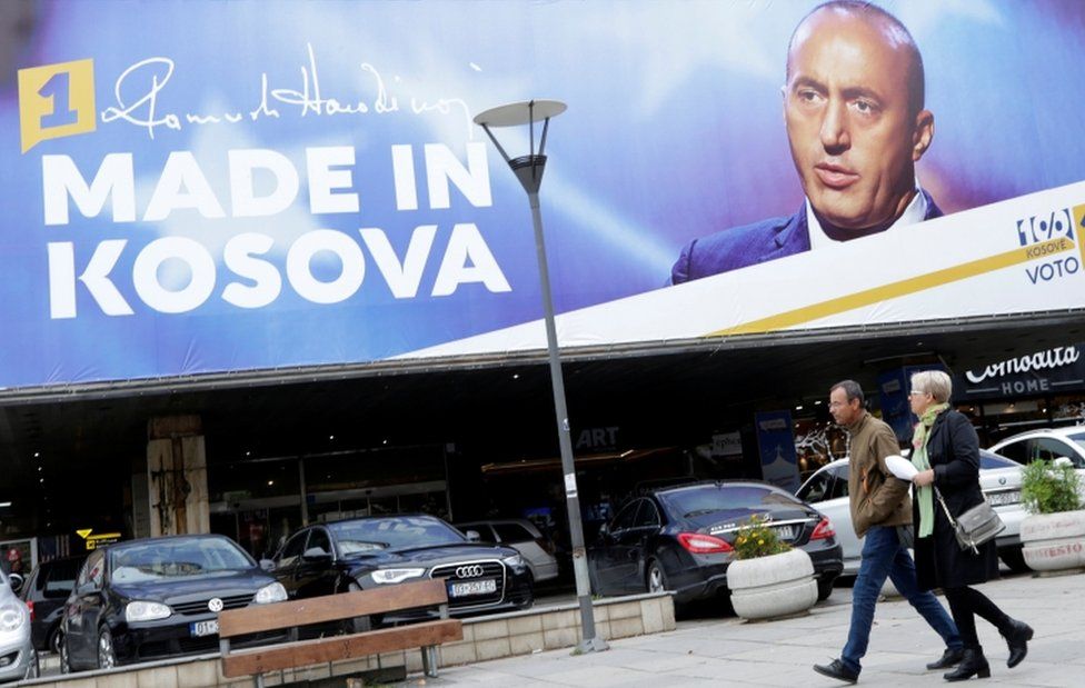 A billboard shows Ramush Haradinaj, leader of the Alliance for the Future of Kosovo (AAK) in Pristina