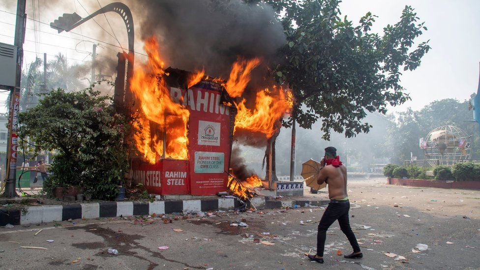A police box set on fire as Bangladesh Nationalist Party supporters participate in a protest demanding the resignation of Prime Minister Sheikh Hasina in Dhaka, Bangladesh, 28 October 2023.