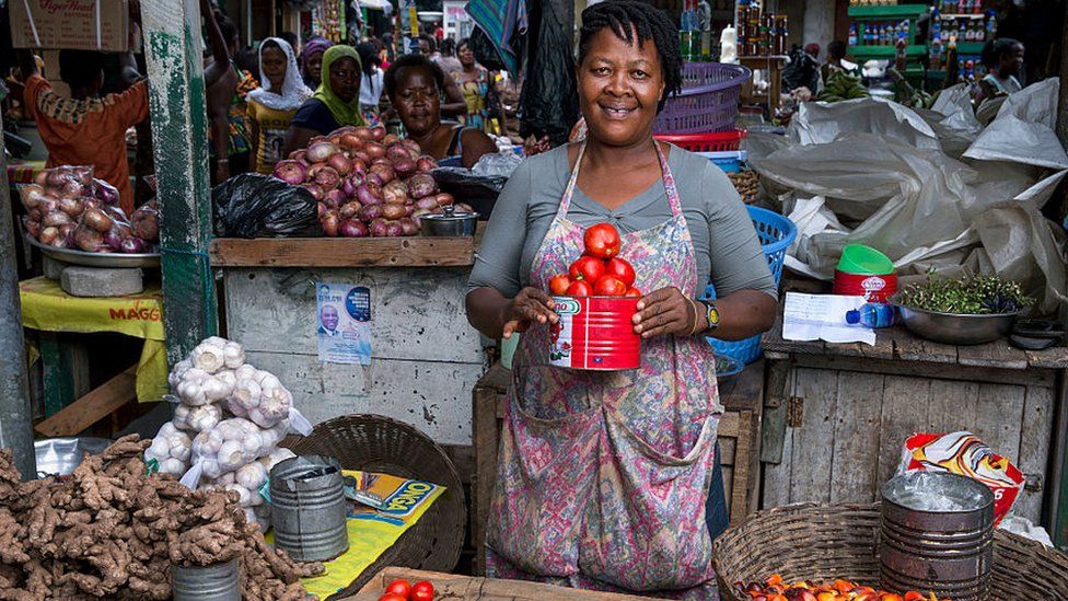 A vegetable trader at Circle market in Accra, Ghana - August 2015