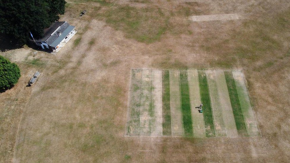An aerial view of a dried out cricket field at Boughton and Eastwell Cricket Club in Ashford, Kent