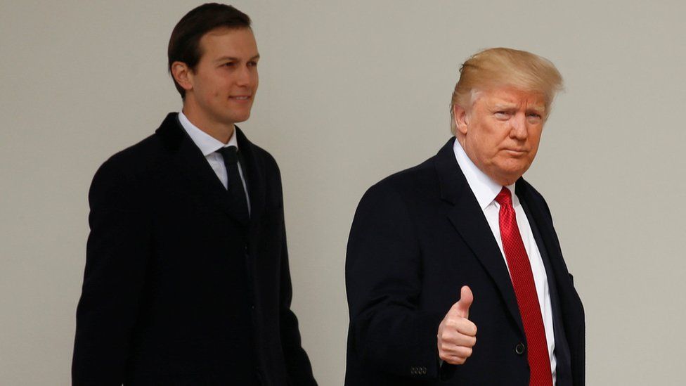 US President Donald Trump gives a thumbs-up as he and Senior Advisor Jared Kushner depart the White House in Washington, 15 March 2017