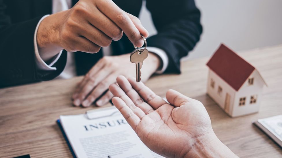 Letting agent handing over a property key