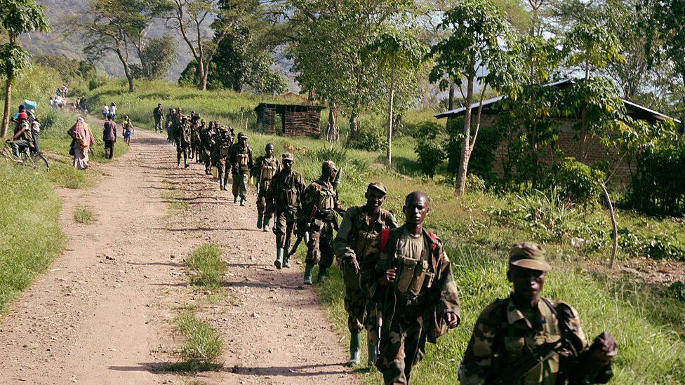 Soldiers from the Uganda People Defense Forces (UPDF) patrol near the border with Congo after they engaged rebels from the Congolese Allied Democratic Force (ADF) in a fierce battle 28 March 2007 on the banks of Semuliki River