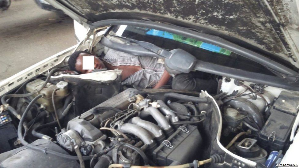 Migrant hiding next to car engine, Guardia Civil photo